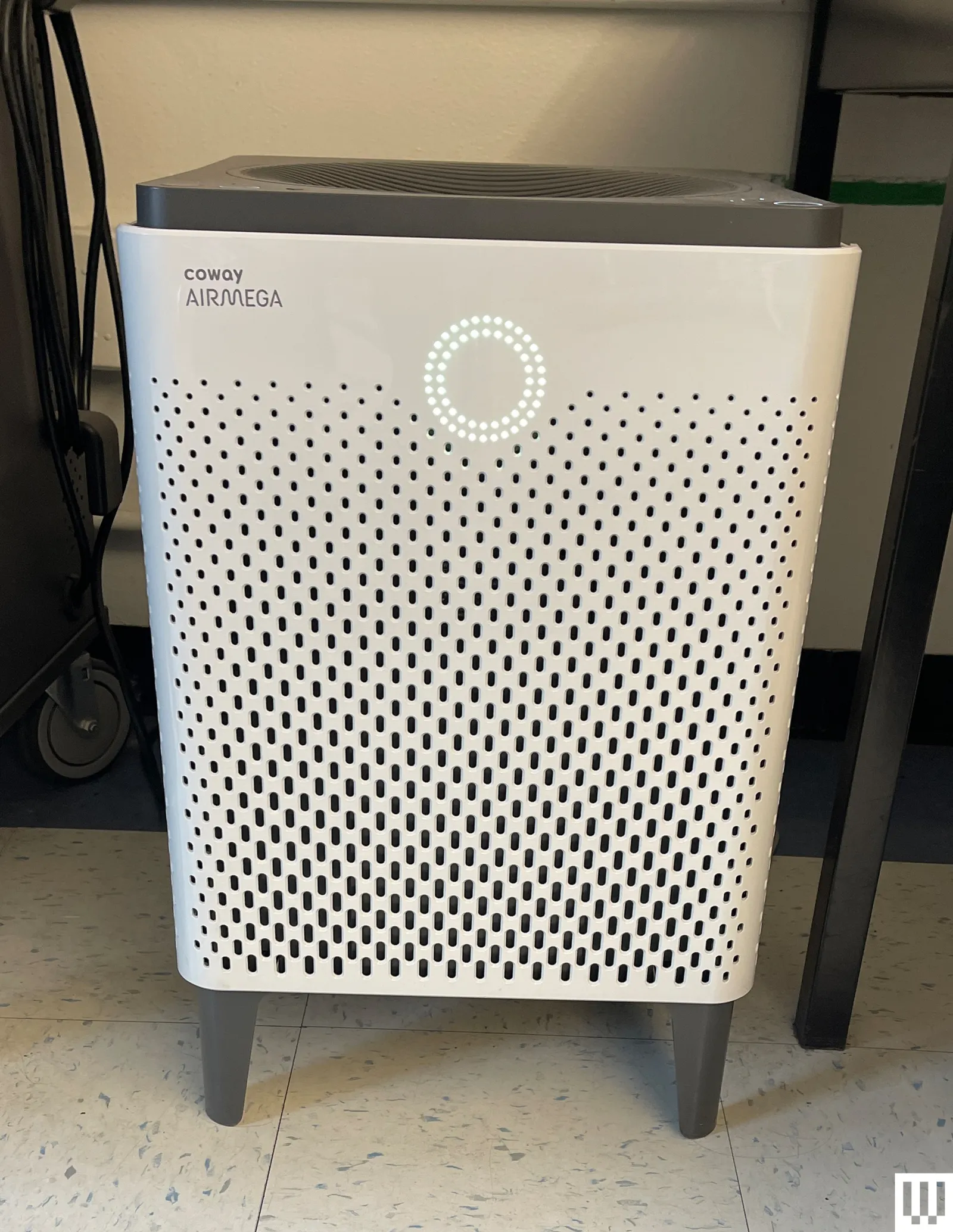 Coway Airmega 400S a white rectangular device in front of a white wall