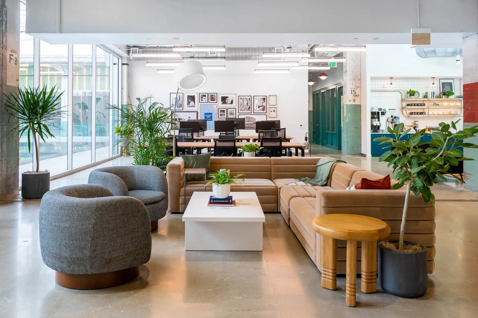 Image may contain Home Decor Indoors Architecture Building Furniture Living Room Room Foyer Couch and Table